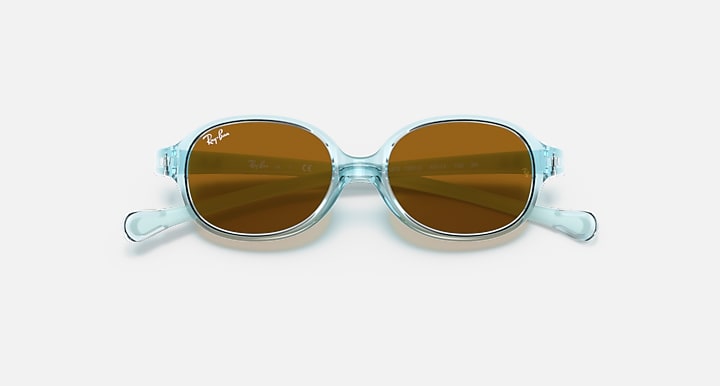 Kids oval sunglasses with transparent light blue frame and brown tinted lenses