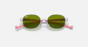 Clear oval sunglasses with green tinted lenses and pink temple accents