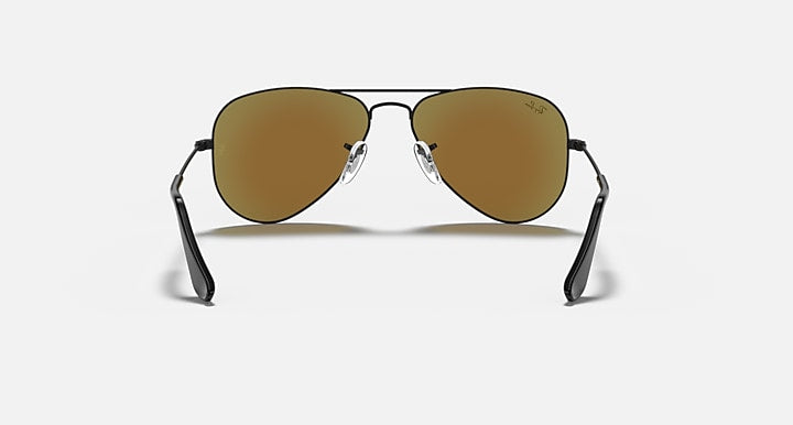 Gold aviator sunglasses with brown gradient lenses and metal wire frame