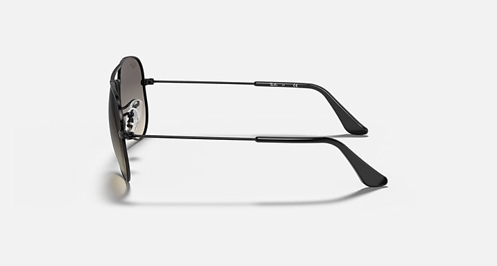 Ray-Ban metal aviator sunglasses with black frame and dark lenses, side view