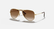 Ray-Ban aviator sunglasses with gold metal frame and brown gradient lenses