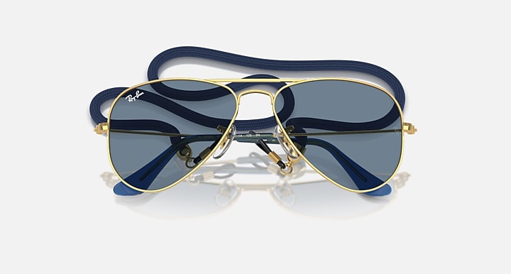 Ray-Ban aviator sunglasses with gold frame and blue mirrored lenses, top view