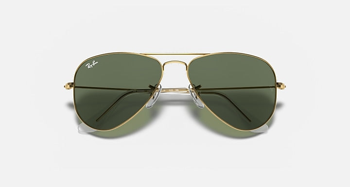 Junior metal aviator sunglasses, close front, gold frame with dark green lenses