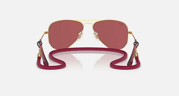 Ray-Ban aviator sunglasses, rose-gold frame with maroon lenses and burgundy adjustable strap