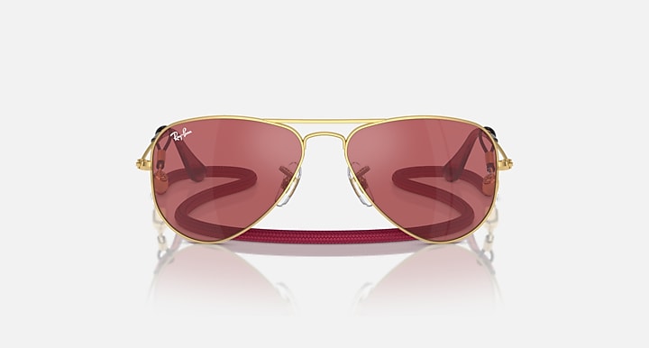 Ray-Ban aviator sunglasses, rose-gold frame with maroon gradient lenses, front view