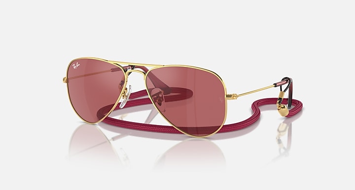 Ray-Ban aviator sunglasses with rose-gold frame and maroon gradient lenses