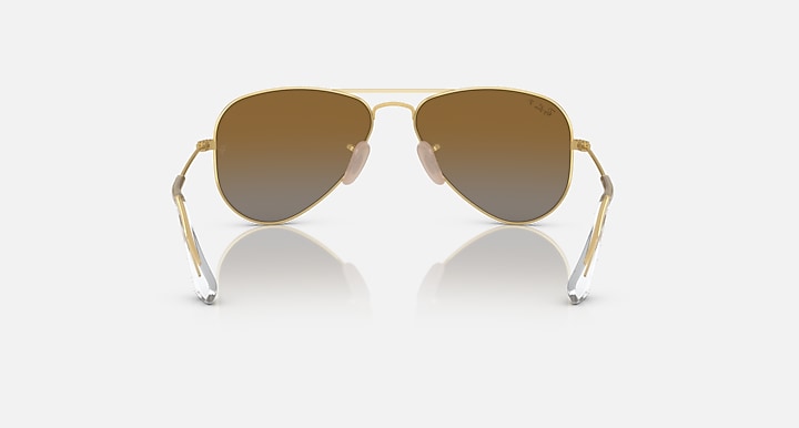 Ray-Ban aviator sunglasses with gold frame and dark brown lenses, front view