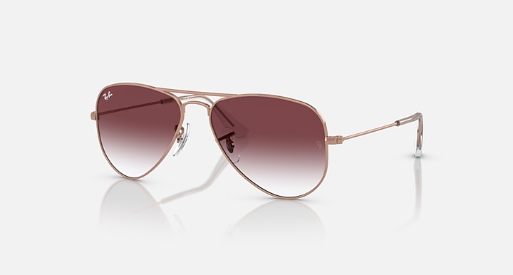 Ray-Ban metal aviator sunglasses with rose-gold frame and dark maroon gradient lenses