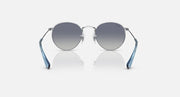 Ray-Ban round sunglasses with silver frame, blue temples, and gray gradient lenses