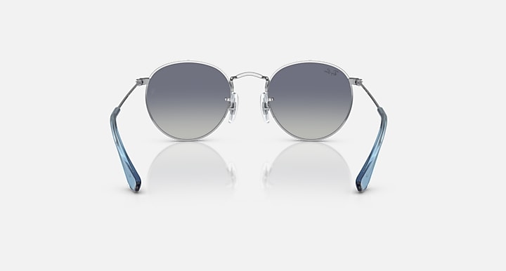 Ray-Ban round sunglasses with silver frame, blue temples, and gray gradient lenses