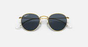 Gold round sunglasses with dark lenses, thin metal frame and small logo on arms.