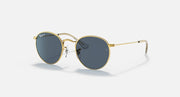Gold round sunglasses with dark blue lenses, metal bridge and slim arms.