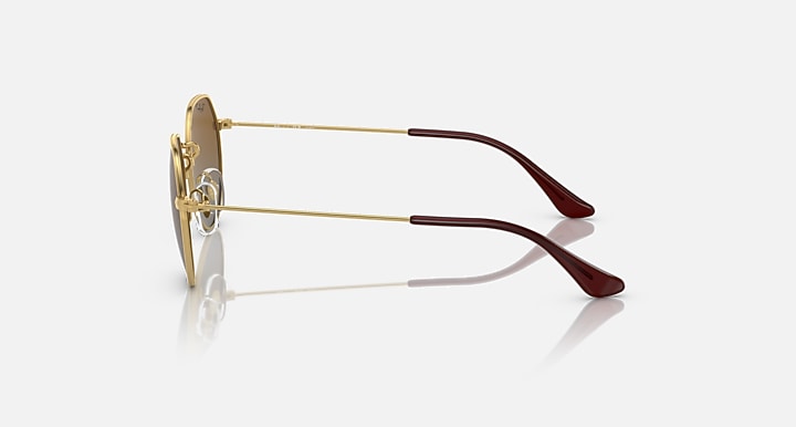 Ray-Ban Junior Jack sunglasses with gold frame and dark tortoise-style temple tips