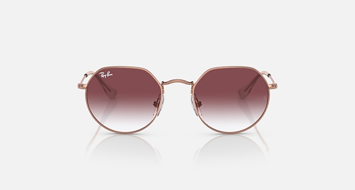 Ray-Ban Junior Jack kids round sunglasses, rose gold frame with maroon-to-violet gradient lenses.