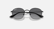 Ray-Ban Junior round sunglasses, black frame, dark gradient lenses, front view
