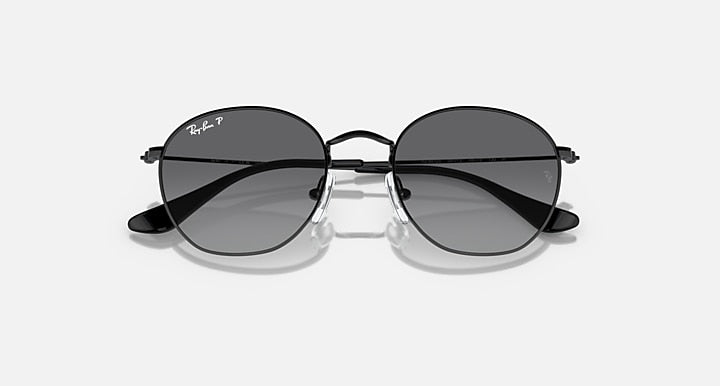 Ray-Ban Junior round sunglasses, black frame, dark gradient lenses, front view
