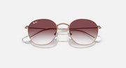 Ray-Ban Junior round sunglasses with burgundy gradient lenses and rose-gold frame