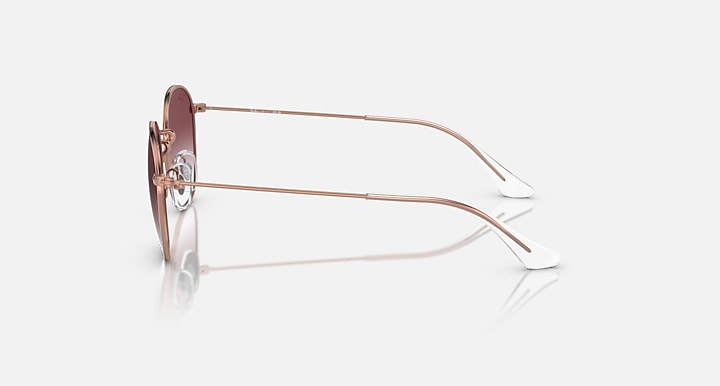 Ray-Ban Junior sunglasses side view with rose-gold metal arms and white tips