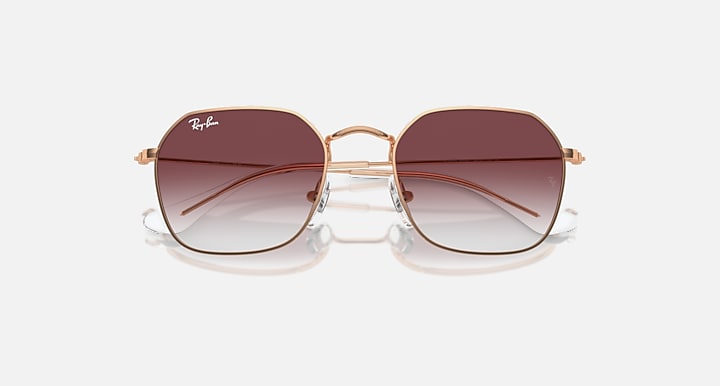 Gold-tone junior sunglasses front view with dark maroon gradient lenses and reflections