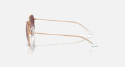 Gold-tone junior sunglasses side view with clear lenses and curved temple arms