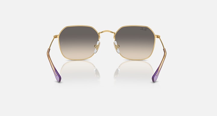 Gold-tone junior sunglasses front view with dark grey gradient lenses and purple accents