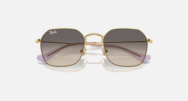Gold-tone junior sunglasses front view with dark grey gradient lenses and purple side tips