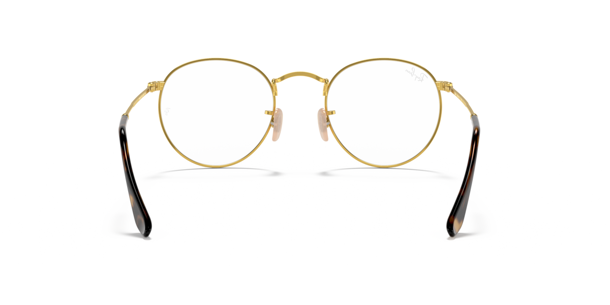 Round metal prescription eyewear frames, gold tone with dark temple sections