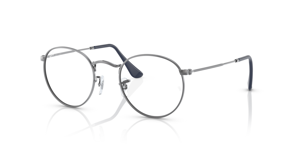 Ray-Ban round metal eyeglass frames with dark green lens details and thin temples
