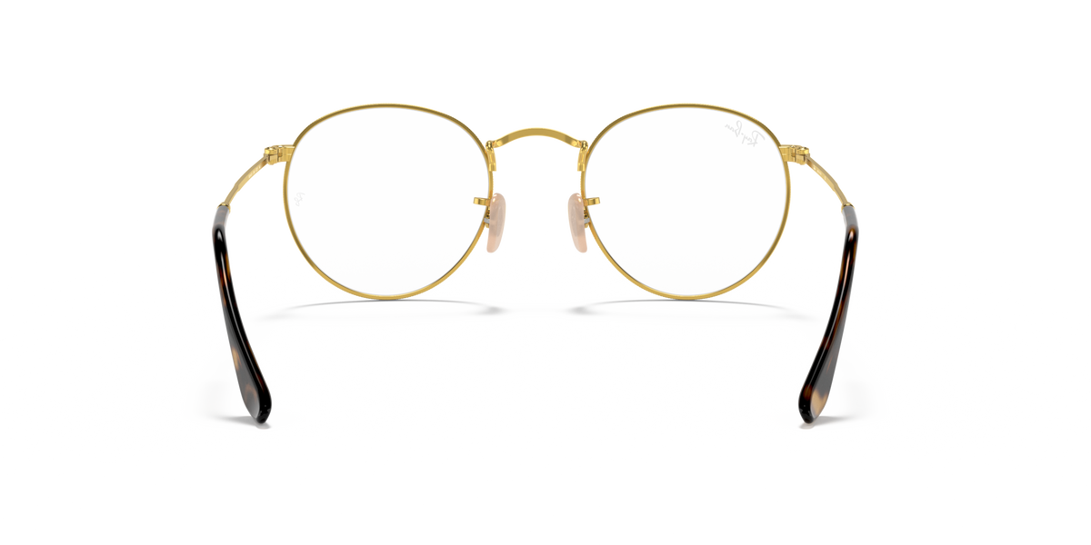 Ray-Ban round metal prescription eyewear frames, gold-tone with dark temple accents