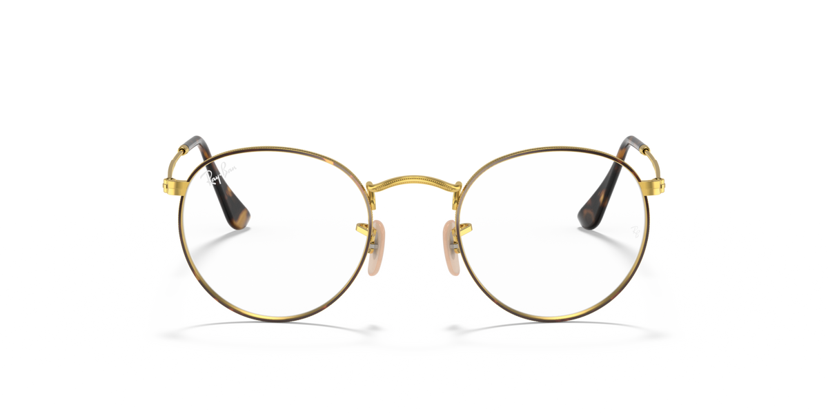Ray-Ban round metal prescription eyewear frames, gold-tone front view with dark tips