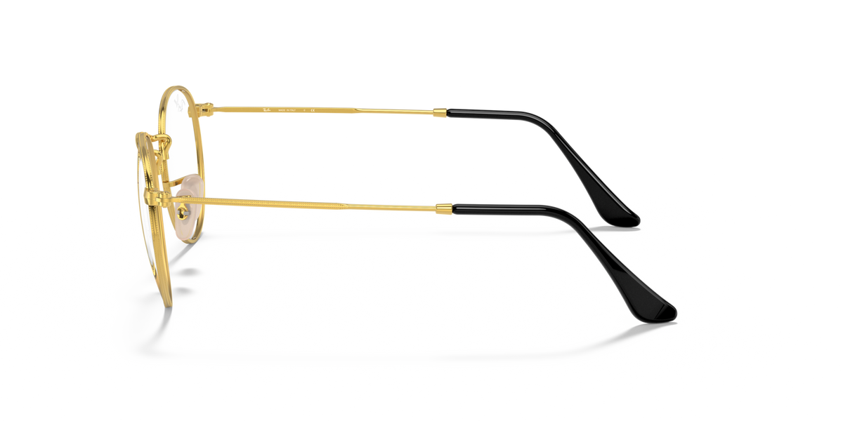 Round metal prescription eyeglass frames, gold front with black temples