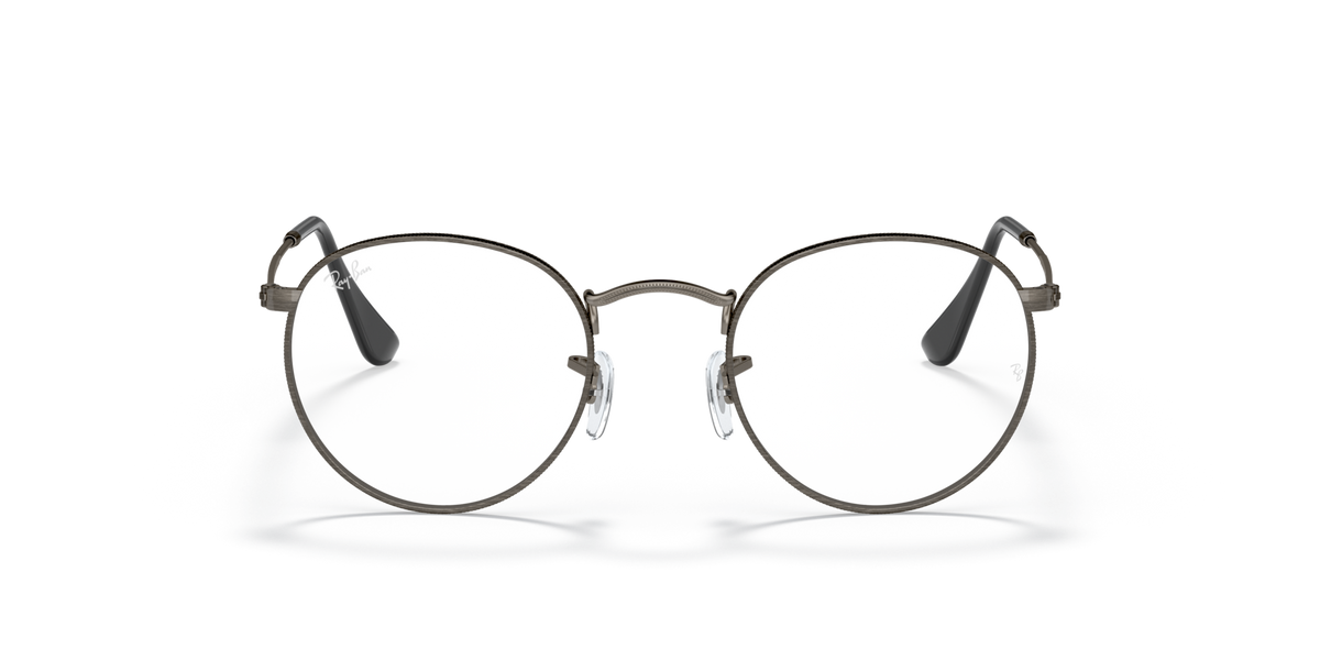 Round metal prescription eyeglass frames with silver-gray rims and dark lenses