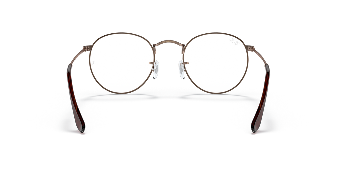 Round metal prescription eyeglass frames, front view, dark rims with brown temple tips
