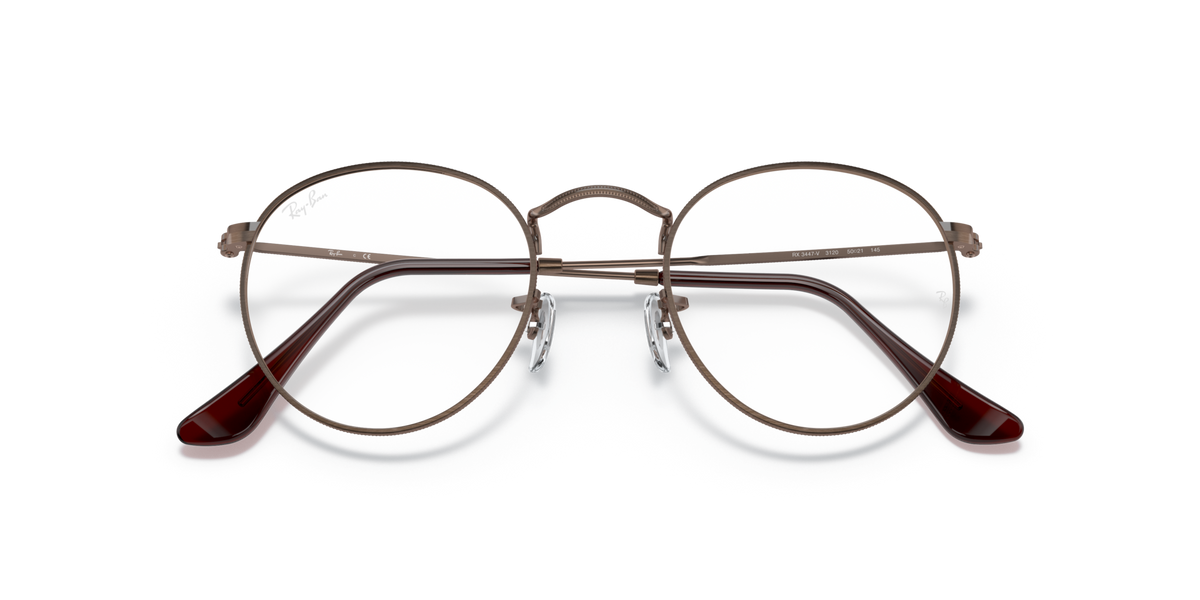 Round metal prescription eyeglass frames, front view, dark rims with brown inner temple arms