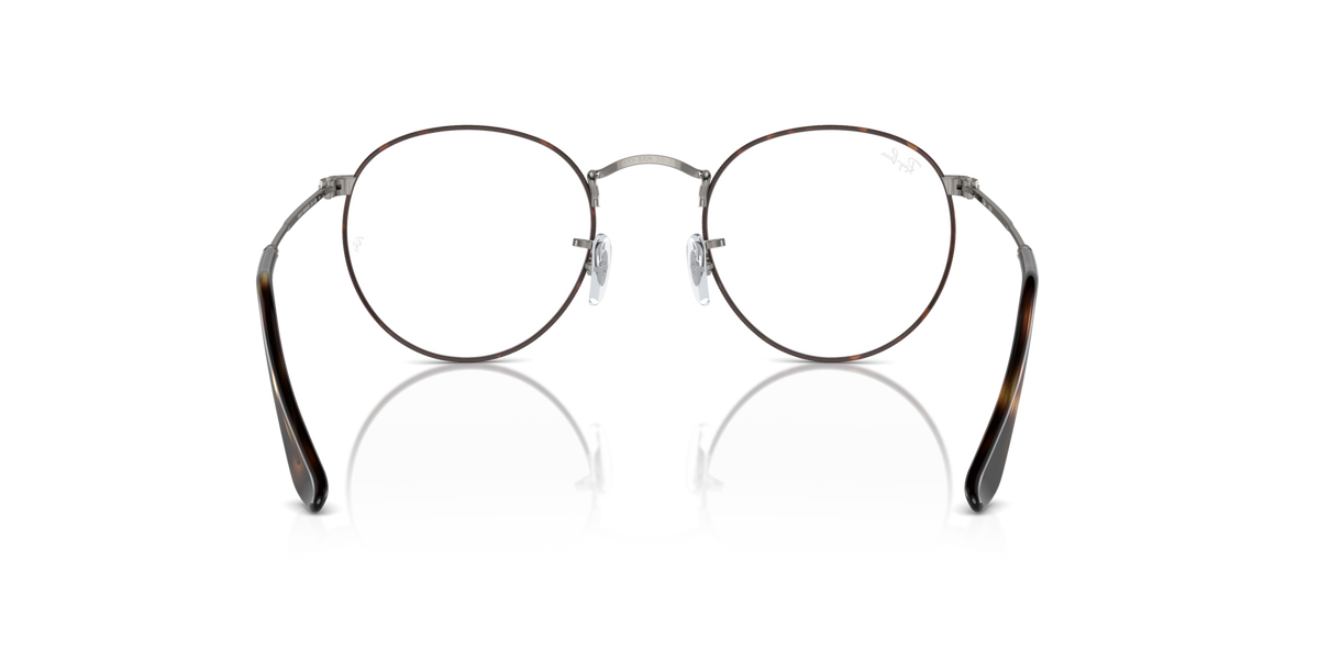 Round metal prescription eyeglass frames showing front and temples with rose-gold accents