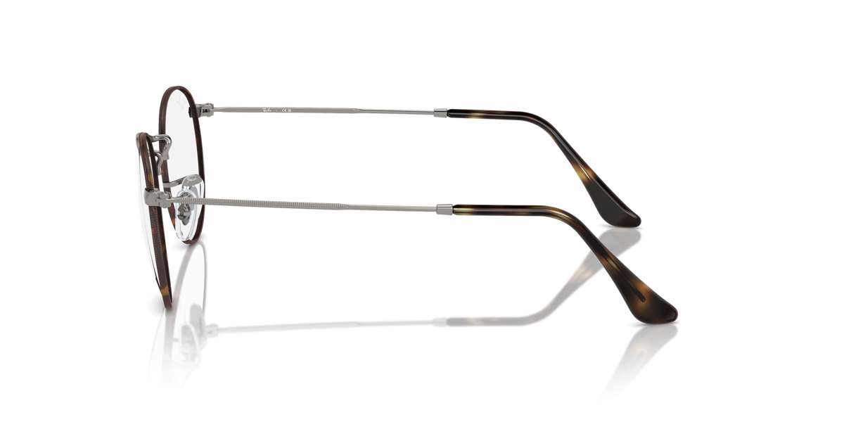 Side angle of round metal prescription eyeglass frames with dark rims and gold-tone hinges