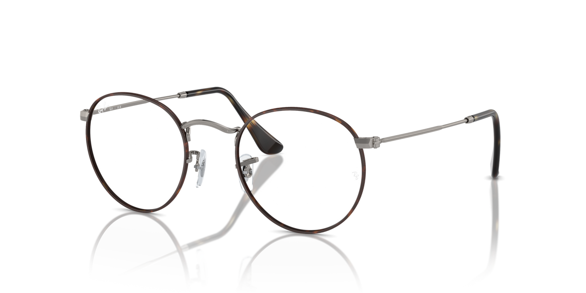 Angle view of round metal prescription eyeglass frames with dark rims and gold-tone temples