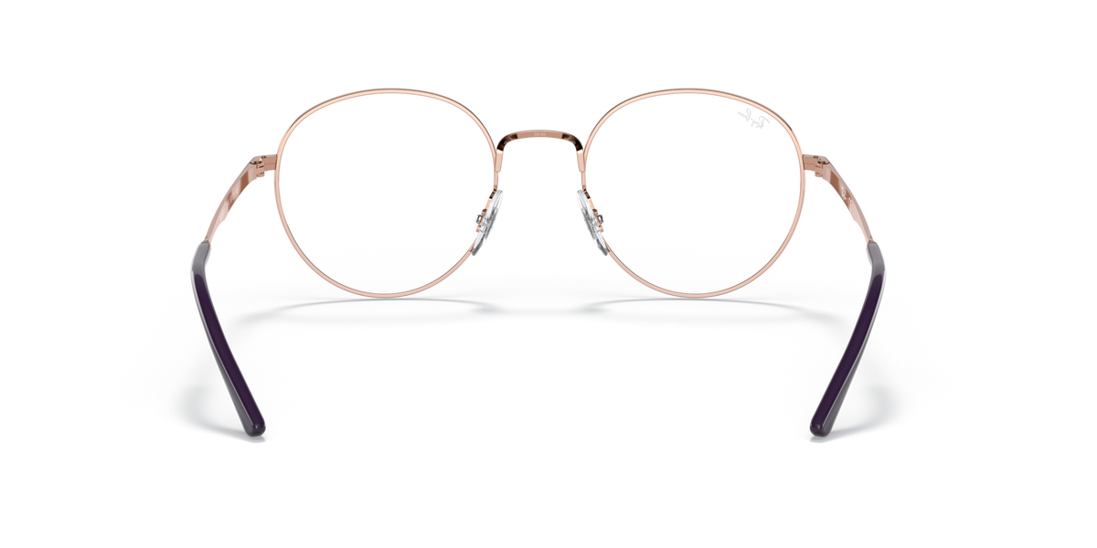 Ray-Ban round prescription frames with rose-gold metal rims and dark temple tips