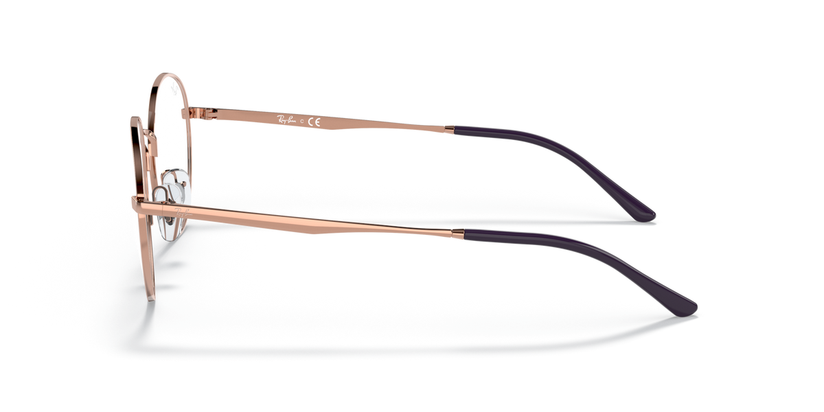Ray-Ban prescription eyewear frames, rose-gold metal with dark temple arms, side view