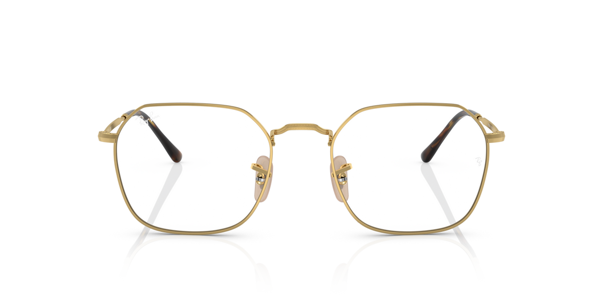 Gold prescription eyewear frames with dark tortoise temples, angled front view