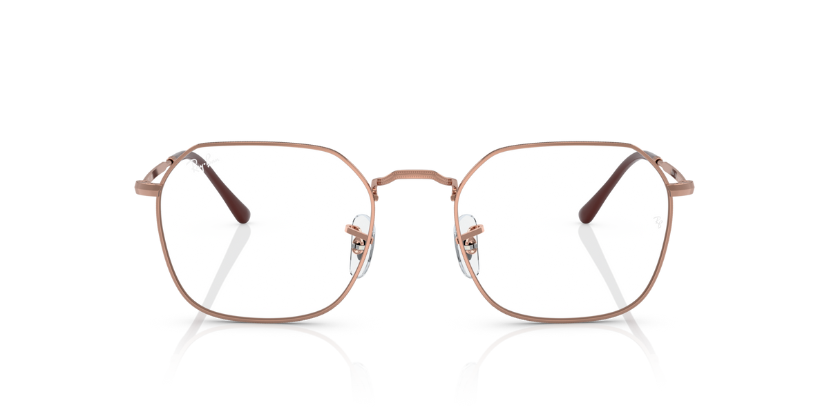 Oval prescription eyewear frames with rose-gold metal, clear lenses, bridge details