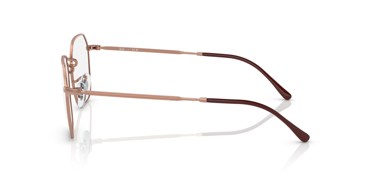 Side view of oval prescription frames in rose-gold with clear lenses