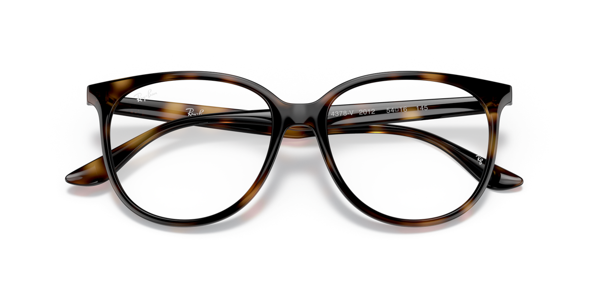 Ray-Ban prescription eyewear frames, translucent havana with black nose bridge