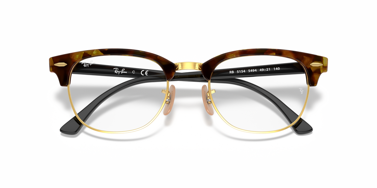 Eyeglass frames with dark brown acetate browline and clear lenses