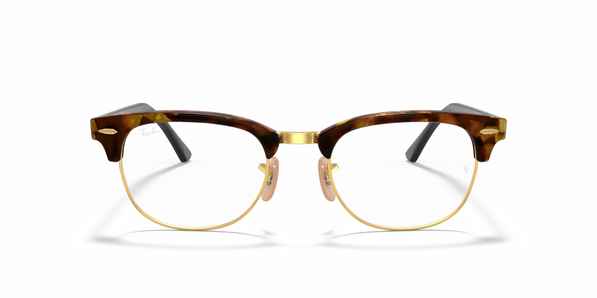 Eyeglass frames with brown tortoise-look acetate and gold-tone metal temples