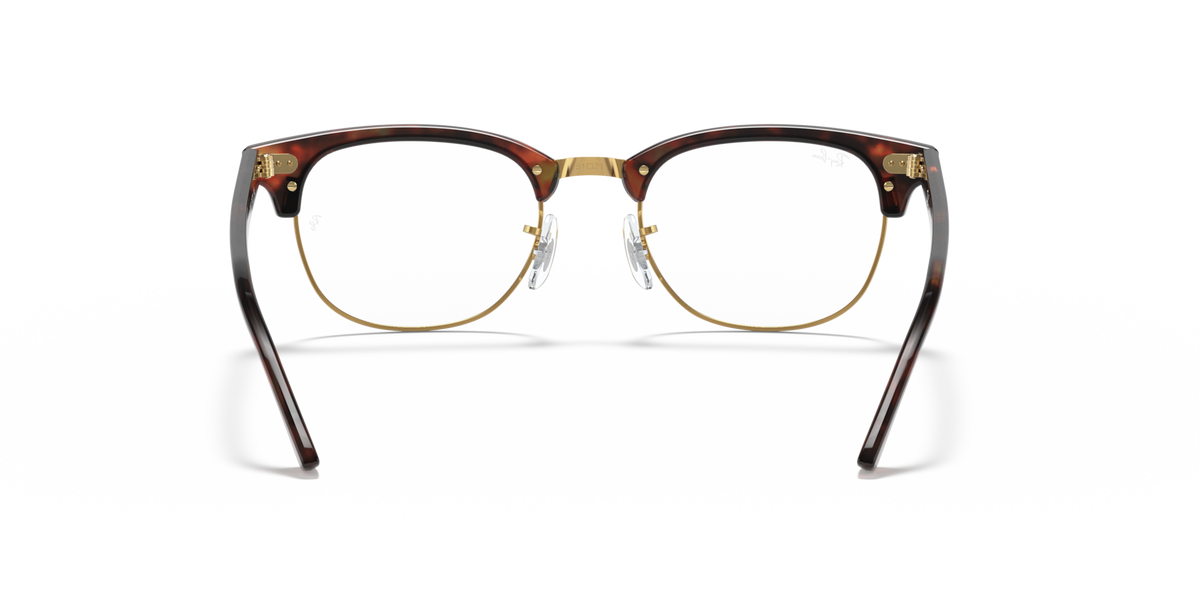 Front view of clubmaster eyeglass frames with dark tortoise front and gold hinges