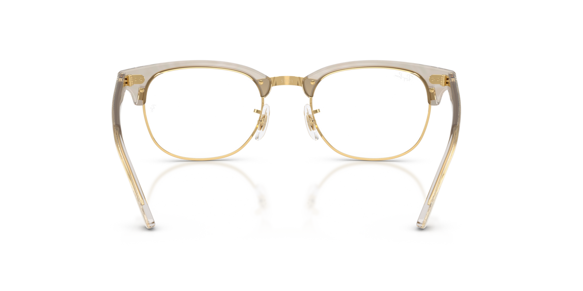 Gold-tone clubmaster eyeglass frames with clear lenses, front view