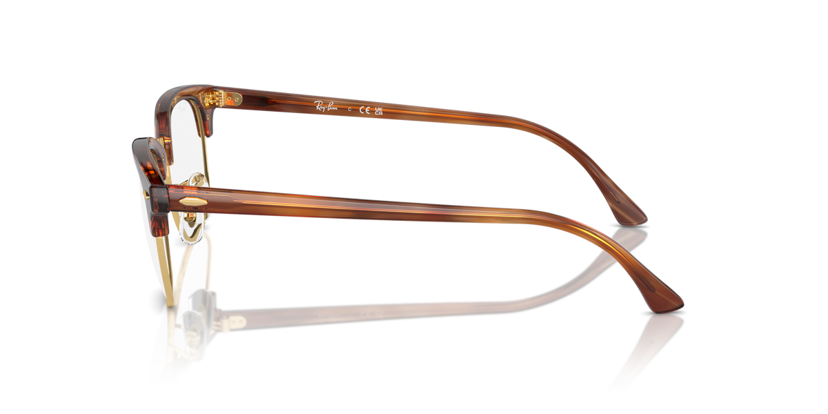 Brown metal eyeglass frames shown in side profile with round lenses