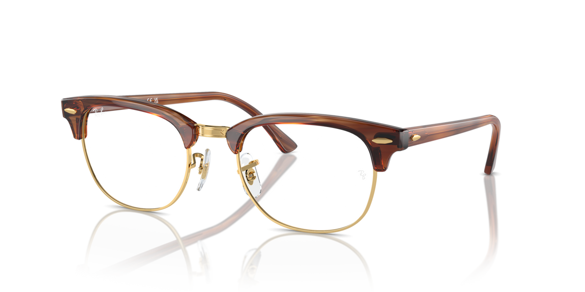 Brown tortoise-style eyeglass frames with round prescription lenses