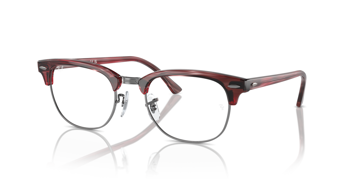 Red-brown eyeglass frames with round prescription lenses and metal temples